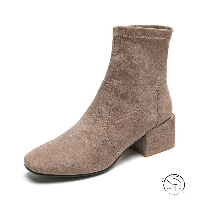Taupe suede ankle boot with low block heel and black velvet accents