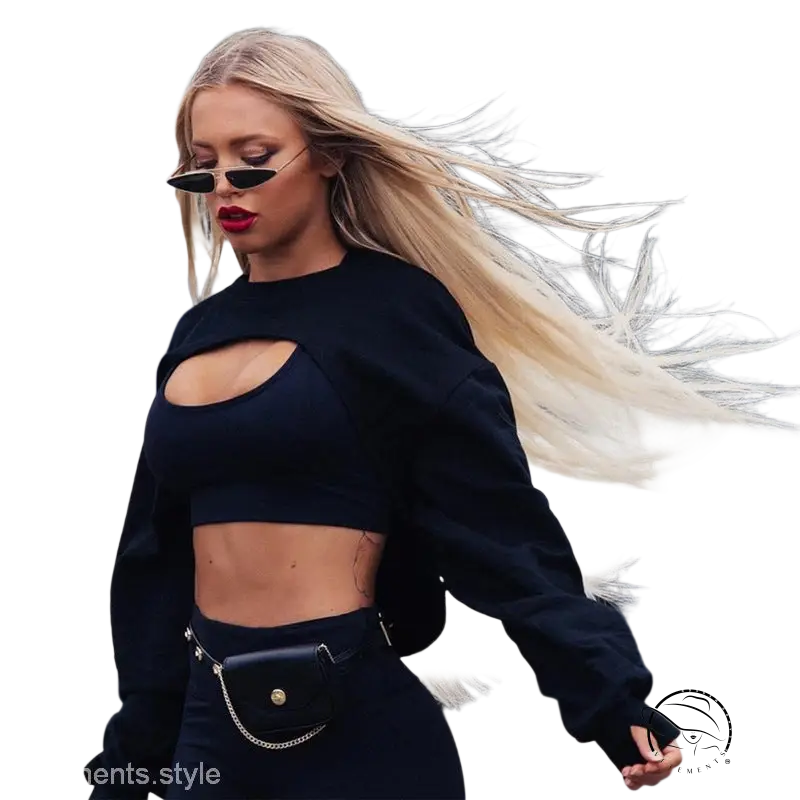 Blonde woman in fashionable fringes sweater with asymmetric solid color design