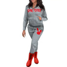 Gray tracksuit with GAME PLAYER text and red bunny graphic, paired with red boots