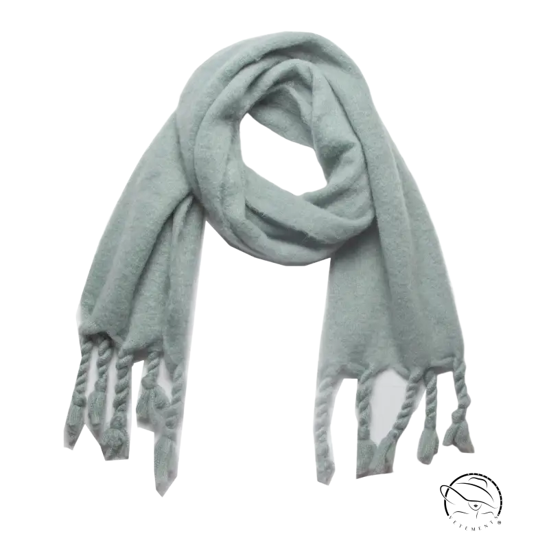 Light blue fuzzy wool scarf with tassels, perfect for winter wear as a stylish shawl