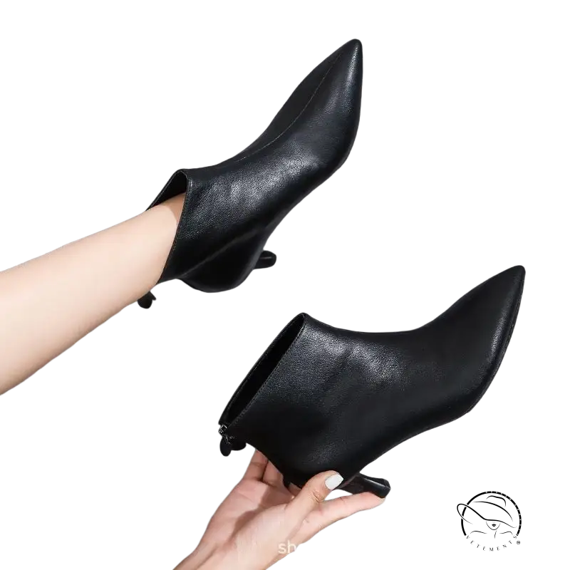 Black leather short boots for women with pointed toe and low heel