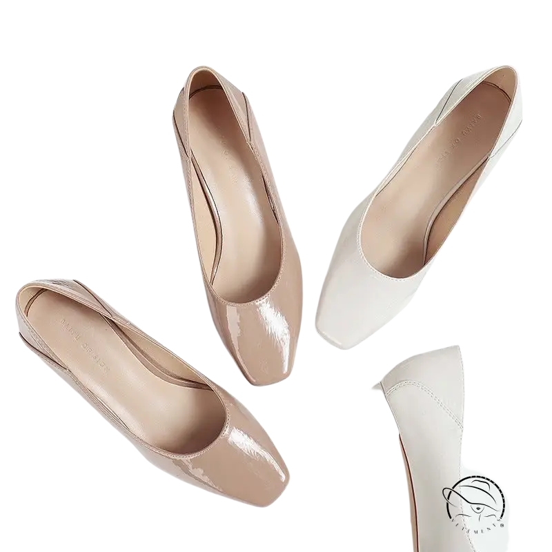 Three pairs of gorgeous high heel leather shoes in neutral colors