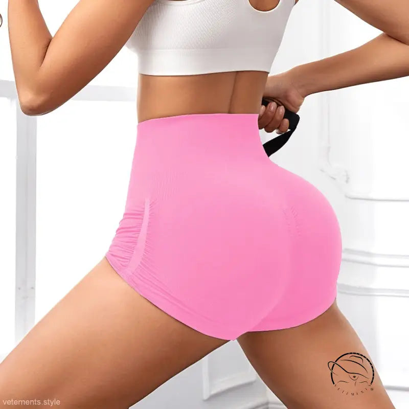 Pink high-waisted peach hip fitness pants with sporty slim ruched design