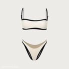 White bikini swimsuit with black trim, perfect for a high waist sexy bikini look