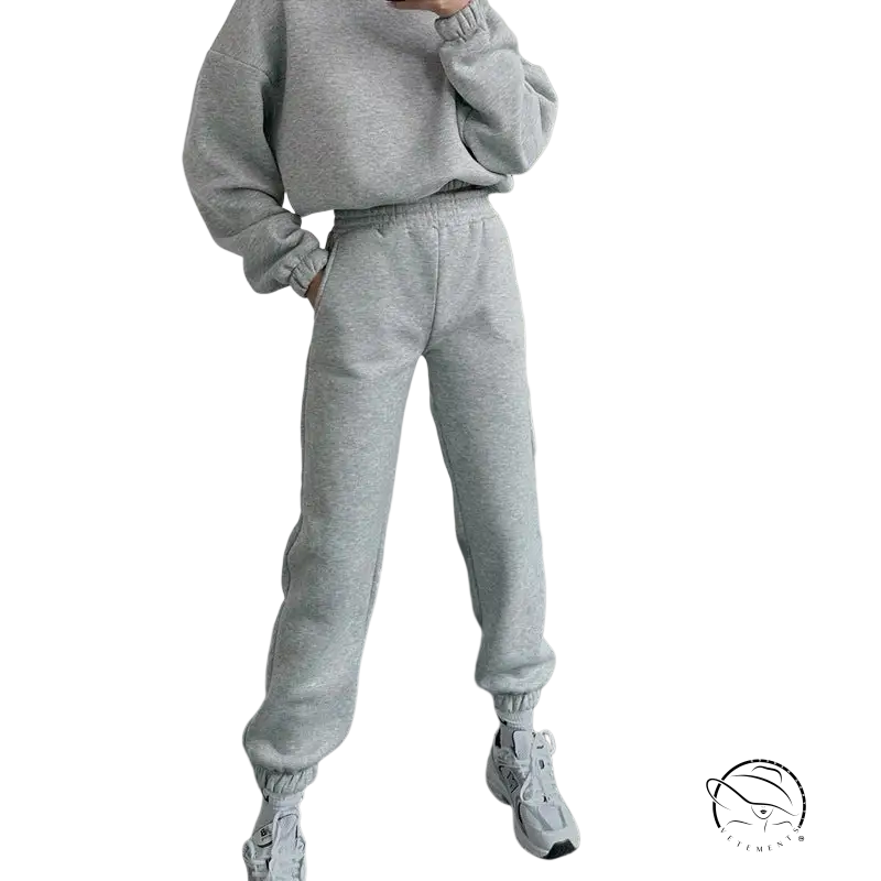 Gray hooded long sleeve sweater with cropped sweatshirt, joggers, white sneakers for winter casual wear