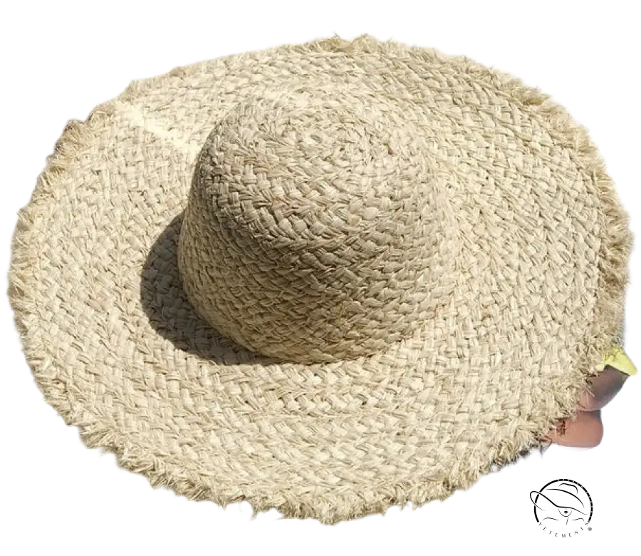 Lack of Color beige woven straw wide brimmed hat with frayed edge