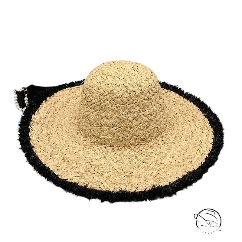 Lack of Color beige woven straw broad brimmed hat with black fringed brim