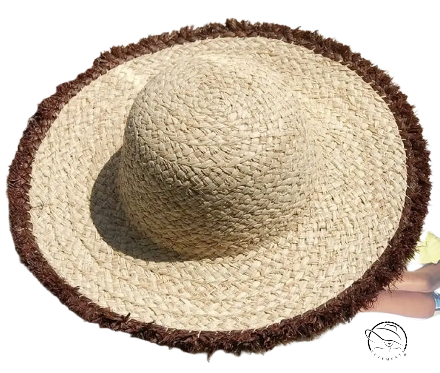Lack of Color beige woven straw broad brimmed sun hat with frayed brown trim