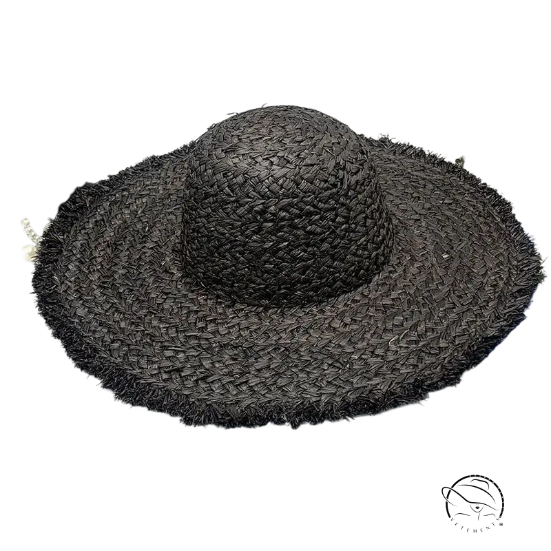 Black woven straw broad brimmed hat with beige ribbon band