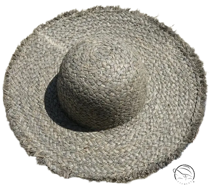 Gray woven straw broad brimmed hat with frayed brim and beige ribbon band
