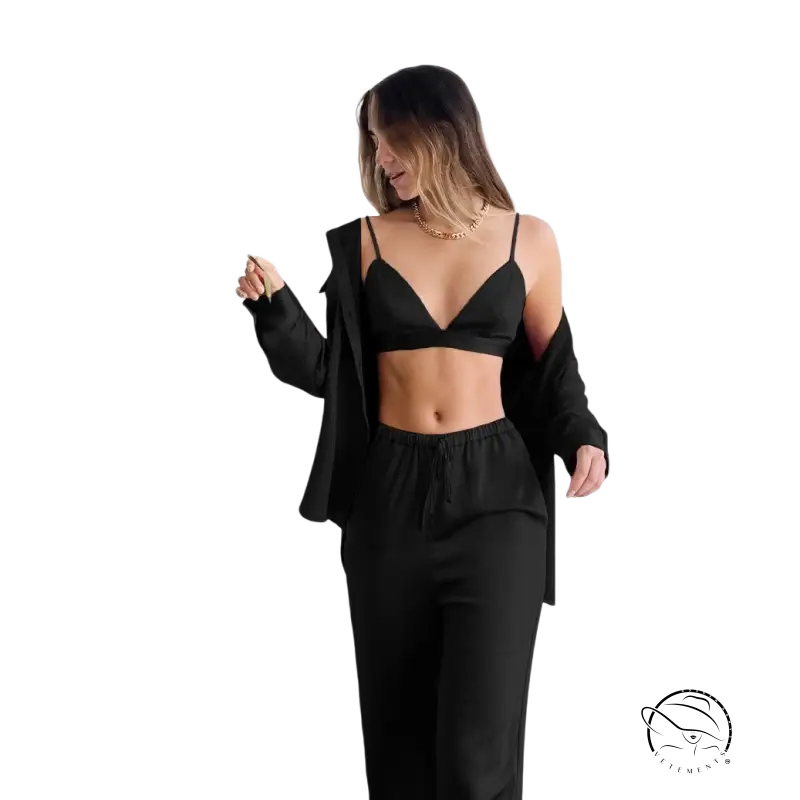 Woman in light brown three piece pajamas with collared shirt