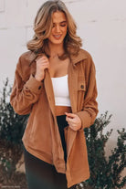Woman wearing a brown corduroy Long Sleeve Warm Shacket Coat, ideal for winter women clothing