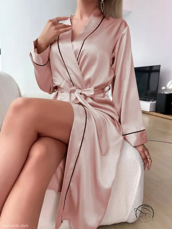 Pink satin robe with black piping, ideal as a sexy cardigan bathrobe or lotus root-inspired piece