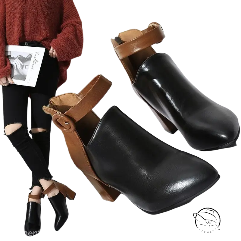 Modern high ankle booties in black leather with tan straps and chunky heels