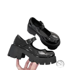 Matte black buckle platform heels with patent leather and chunky sole