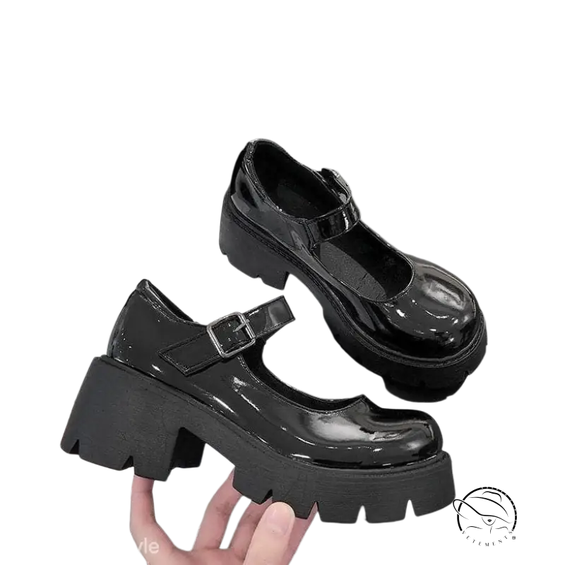 Matte black buckle platform heels with patent leather and chunky sole