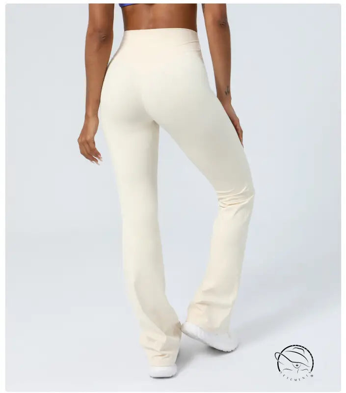Purplish blue flared yoga pants with cream-colored high-waisted design
