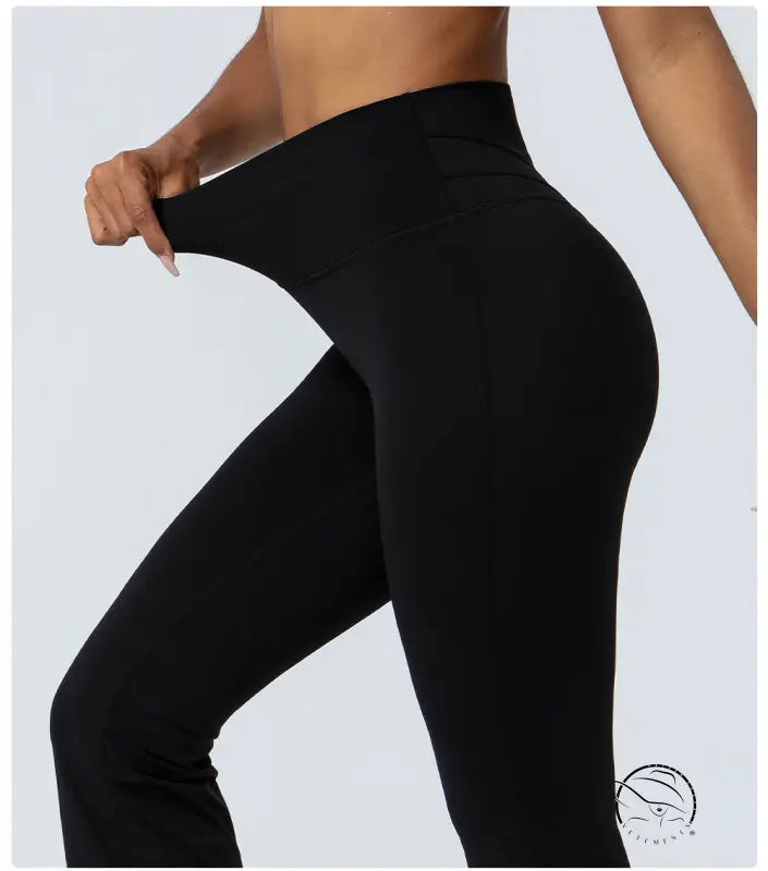 Purplish blue flared yoga pants with stretchy black leggings design