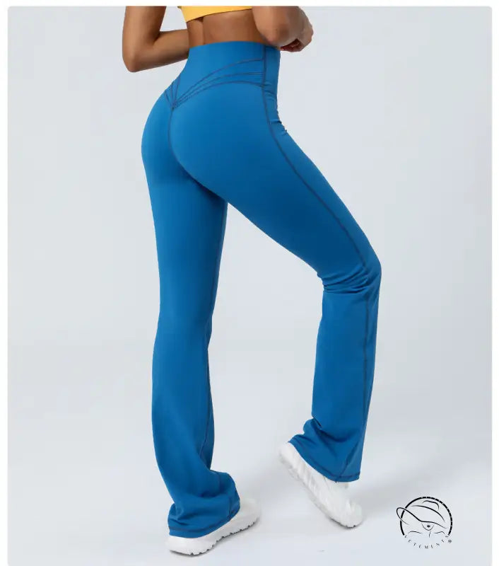Purplish blue flared yoga pants in sporty slim non high rise design