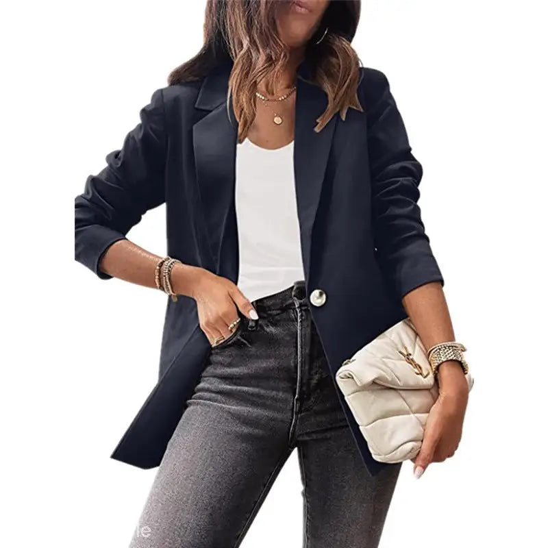 Woman in a purplish blue slim fit jacket for office, part of the Spring/Fall Collection