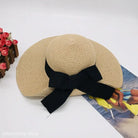 Raffia Bucket Hat with Big Bow Sunshade for stylish sun protection and natural elegance