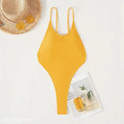 Yellow one-piece swimsuit with thin shoulder straps ideal for a royal blue backless sexy swimsuit