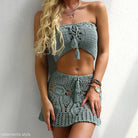Crocheted sage green two-piece outfit with shoulder bikini and tassel details