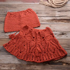 Crocheted coral poncho and skirt set with lace, featuring rusty red beach dress strap