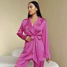 Pink satin comfy pajamas set featuring belted long sleeves, perfect for relaxation