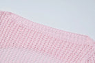Pink crocheted fabric showcasing a backless knitted dress for parties and clubs
