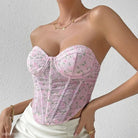Pink floral corset top featuring boning corset waist for a trendy summer fashion look