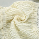 Cream-colored textured knit fabric of Sexy French Cutout Pajamas Set with Lace Sleeves