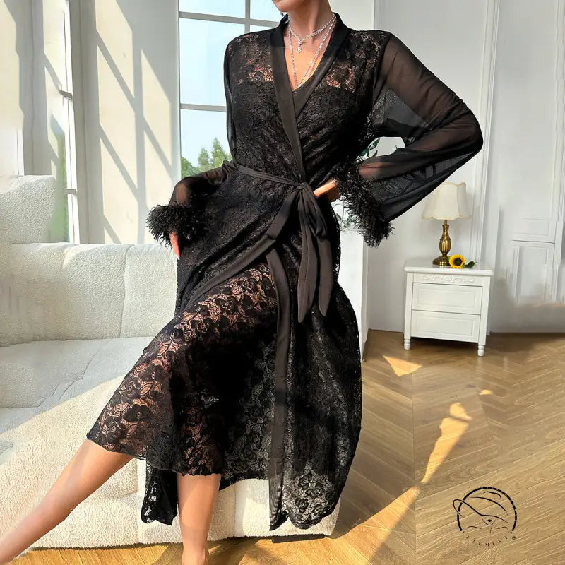 Elegant black lace robe with sheer sleeves and feathered cuffs.