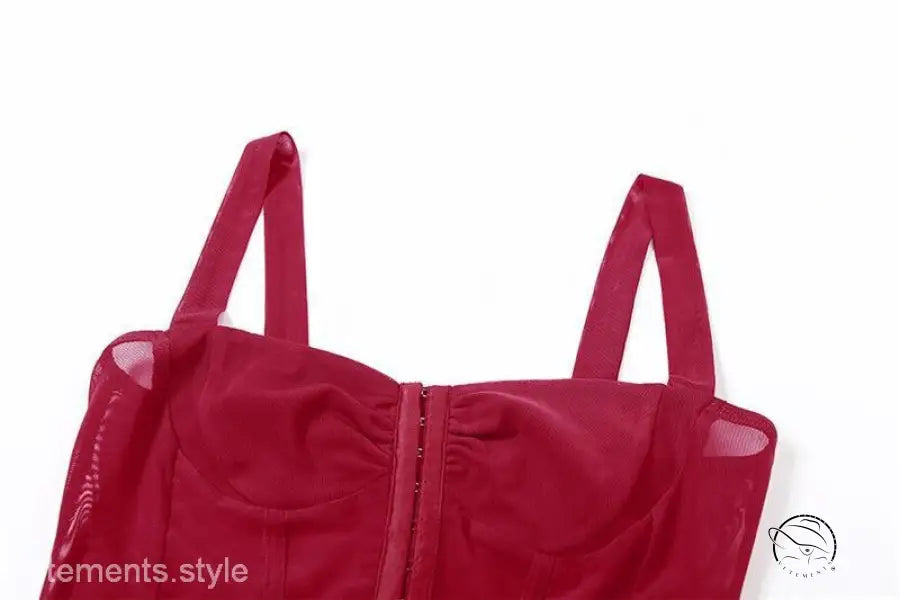 Red bustier-style top with shoulder straps and front closure, perfect for sexy halter spaghetti looks