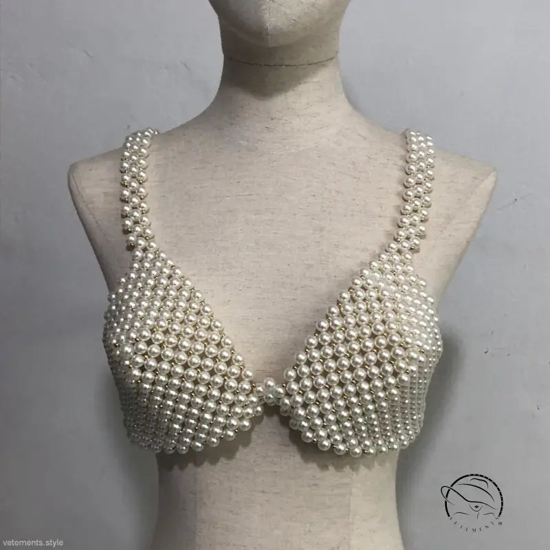 Pearl bra on mannequin showcasing handmade pearl bra and sexy handmade pearl design