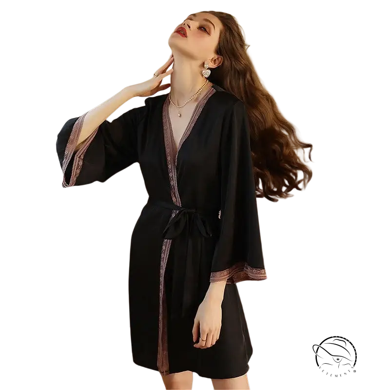 Woman in sexy ice silk robe with lace tulle trim, dramatic pose