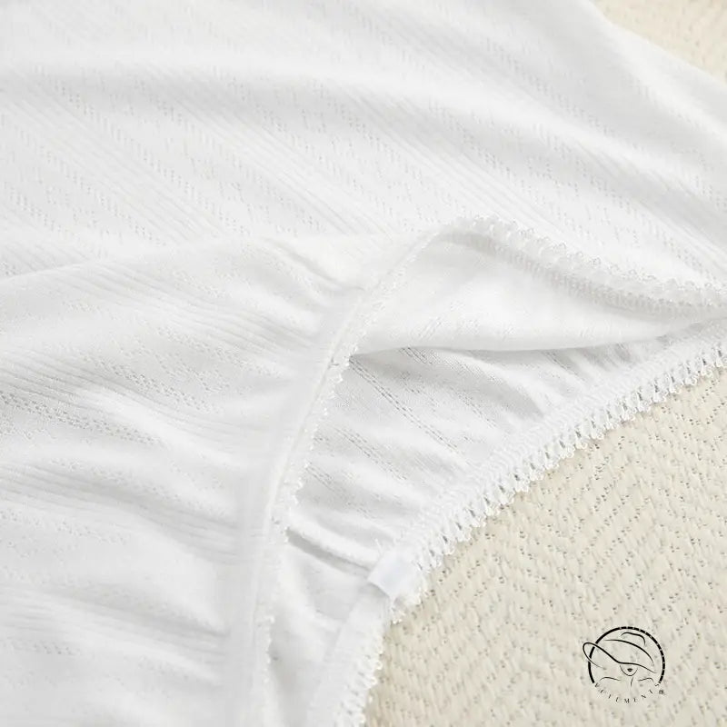 White eyelet-lace trim cotton bedsheet from Knitted Shorts Homewear Set with Sleeveless Crop Top