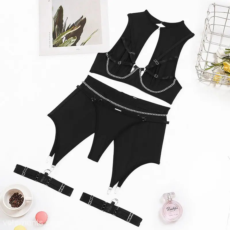 Black lingerie four piece set with chain steel ring push design for sexy appeal