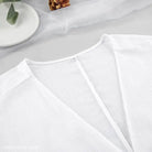 White V-neck top in lightweight fabric from sexy long sleeve pajamas with shorts set