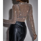 Sequin-embellished sheer long sleeve top paired with sexy mesh slim fit jumpsuit