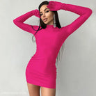 Woman in a sexy sheath long party bodycon dress with long sleeves and dangling earrings