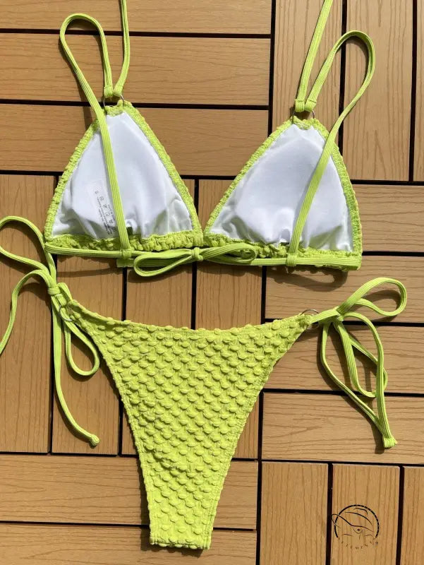 Sexy single swimsuit in lime green and white with boho tie strap