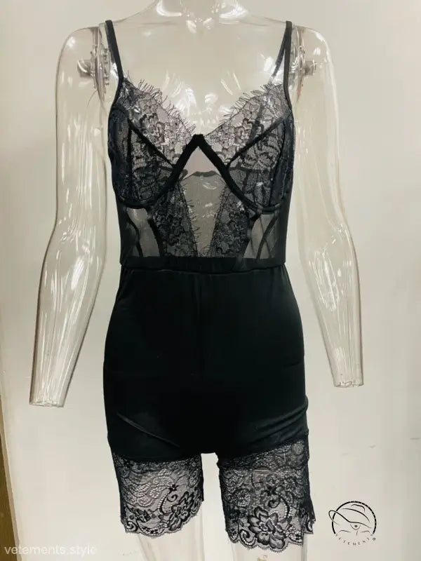 Sexy strappy low-cut black lace bodysuit with sheer panels