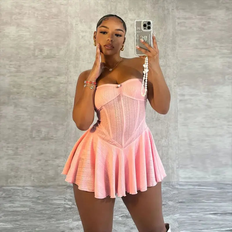 Woman in a pink strapless mini Shoulder Princess Bodycon Dress taking a mirror selfie