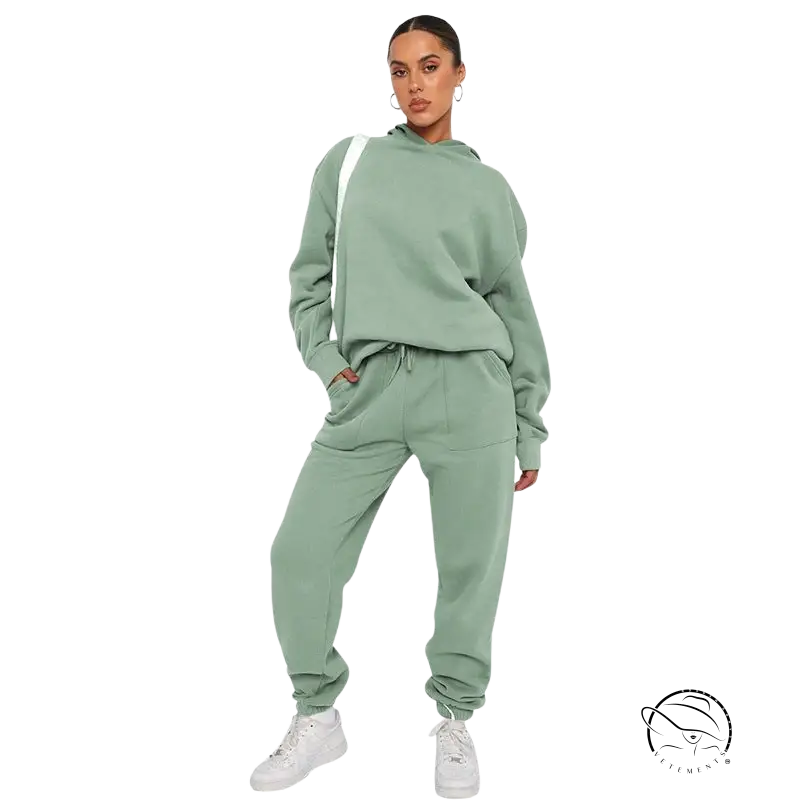 Mint green soft touch trousers with warm comfortable long sleeve sweater and white sneakers