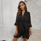 Black silk robe with tie waist and sheer sleeve panels, perfect for sexy satin ruffled pajamas