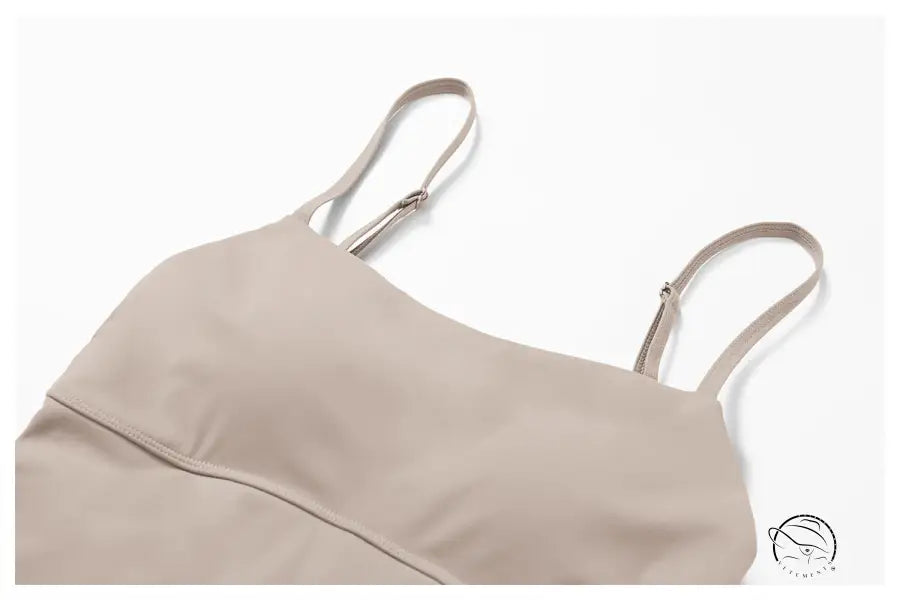 Beige minimalist camisole with silver hardware in barbie pink glaze
