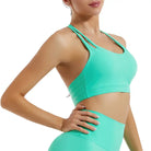 Bright turquoise sports bra and high-waisted shorts from the Sporty Fitness Bra collection