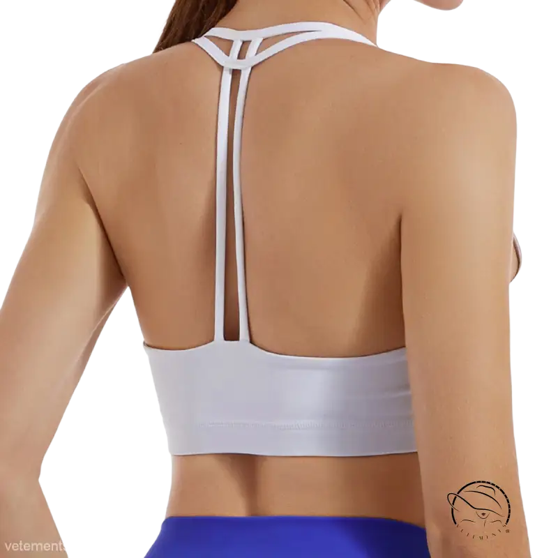 White sports bra with strappy back in hydrangea purple and emerald green
