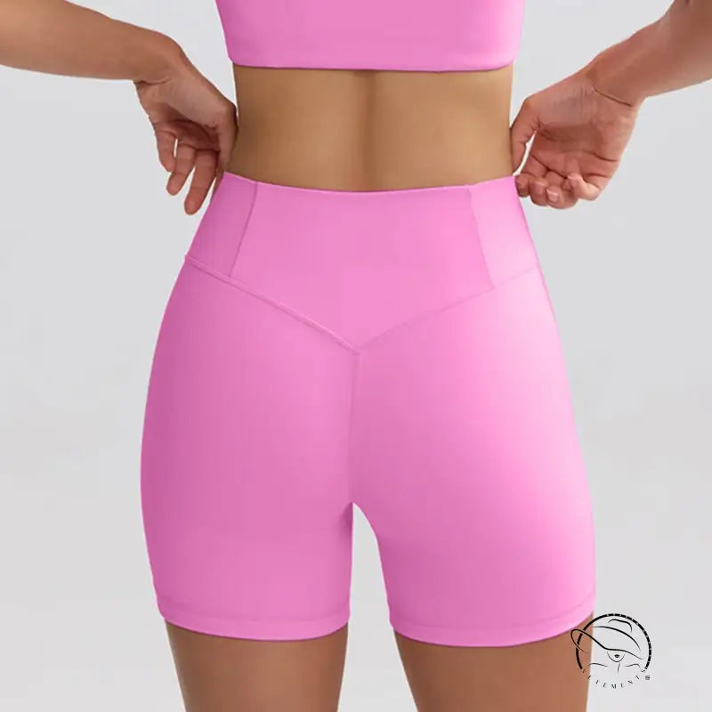 Bright pink high-waisted summer yoga clothes on fit torso